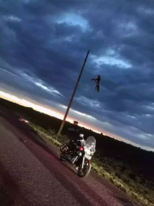 kennedy littledike hanging from power line