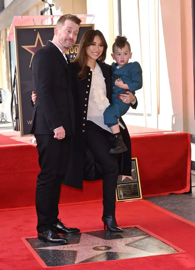 Macaulay Culkin, Brenda Song, and Dakota Song Culkin.