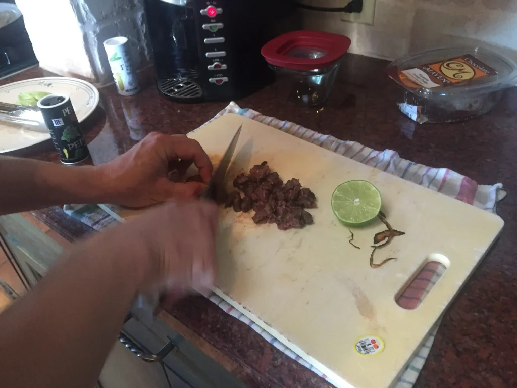 Man chopping amputated leg.