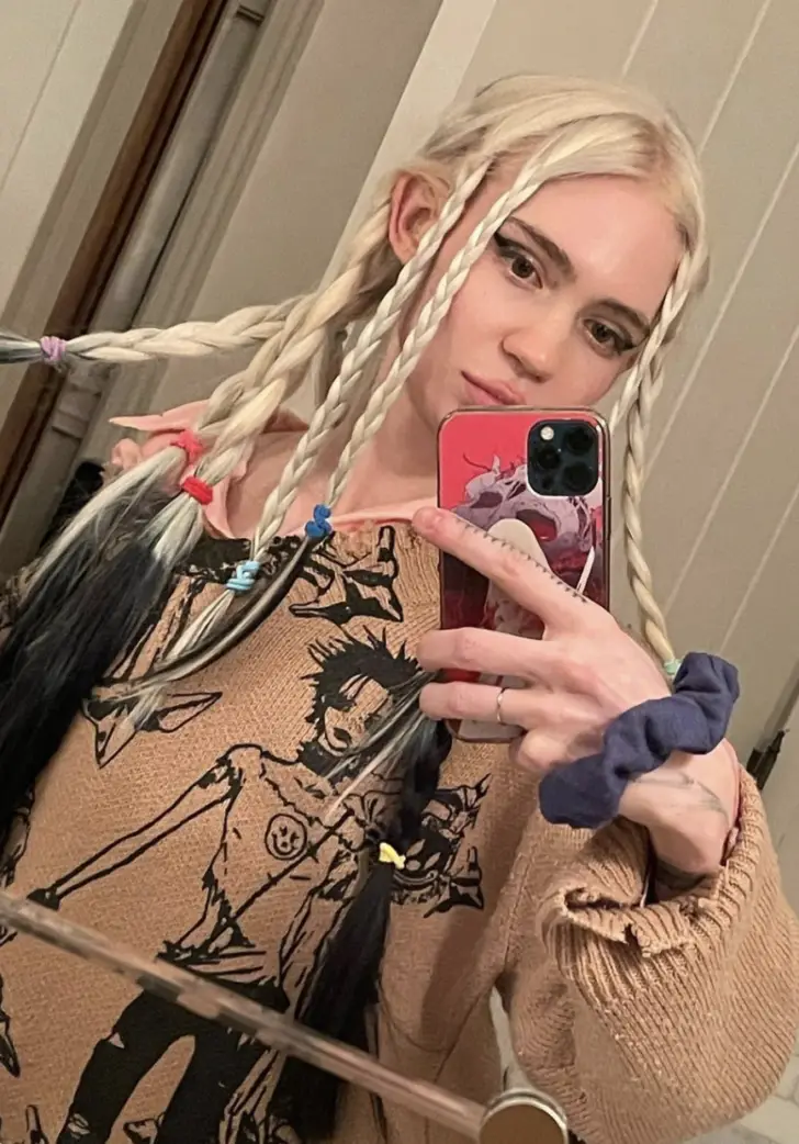 Grimes Says She Cant Identify With The Term Mother 