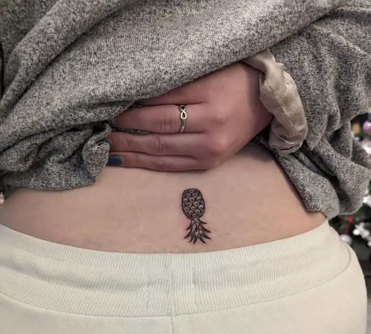 Upside down pineapple tattoo.