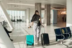 Woman boarding plane.