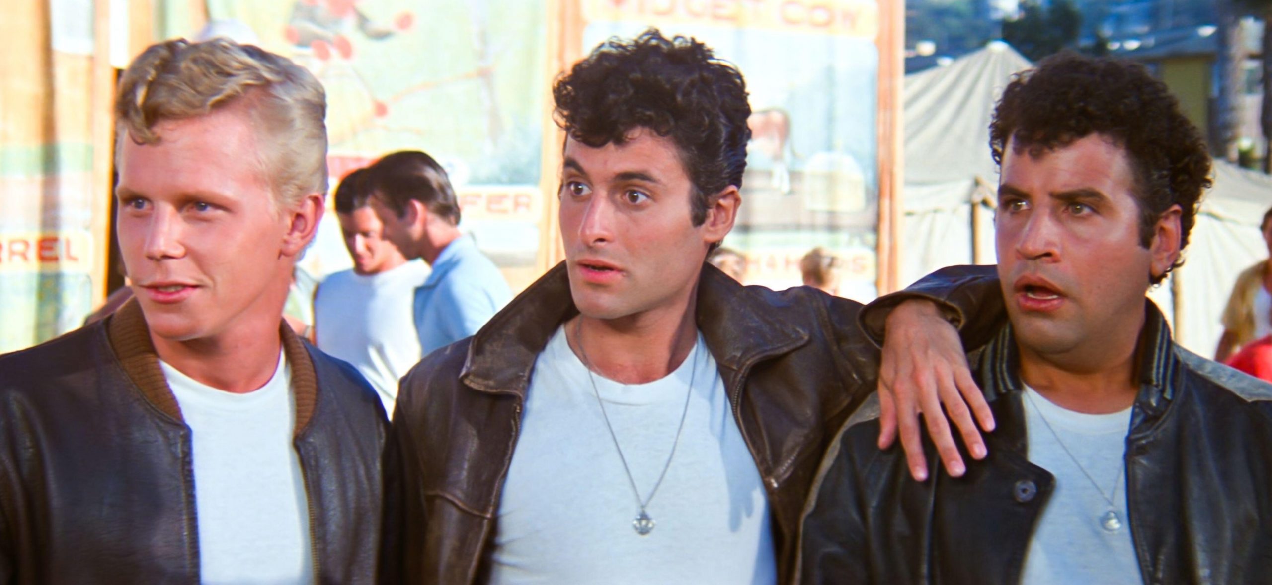 Kelly Ward, Barry Pearl, and Michael Tucci in Grease. 