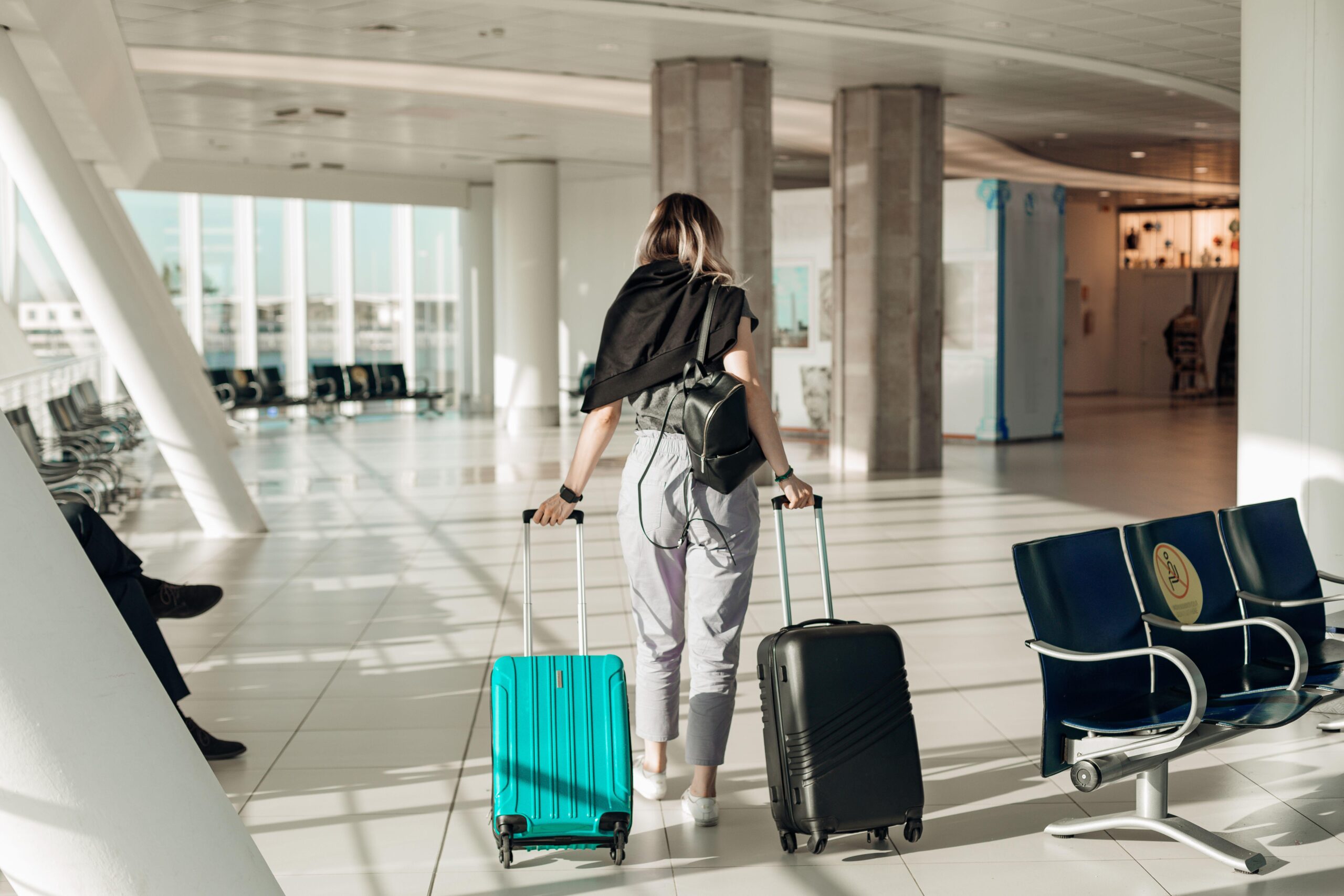 Woman boarding plane.