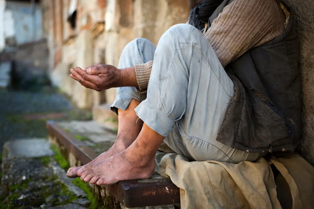 Person begging on the street.