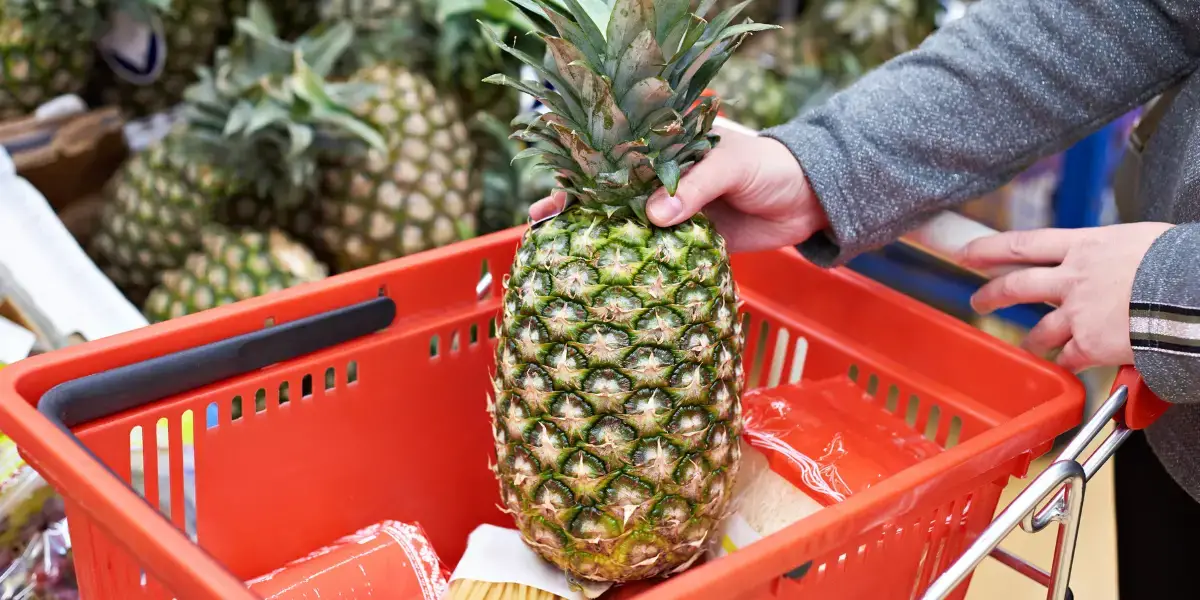 Pineapple in trolley. 