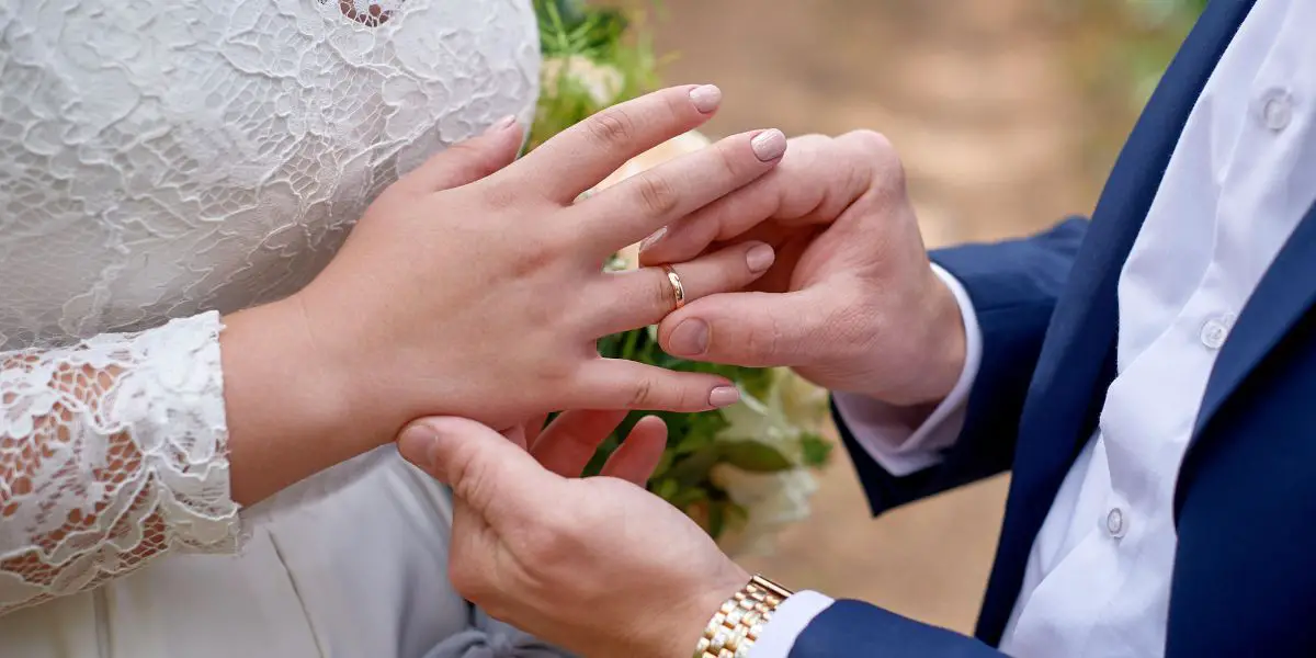 Ring exchange at wedding. 