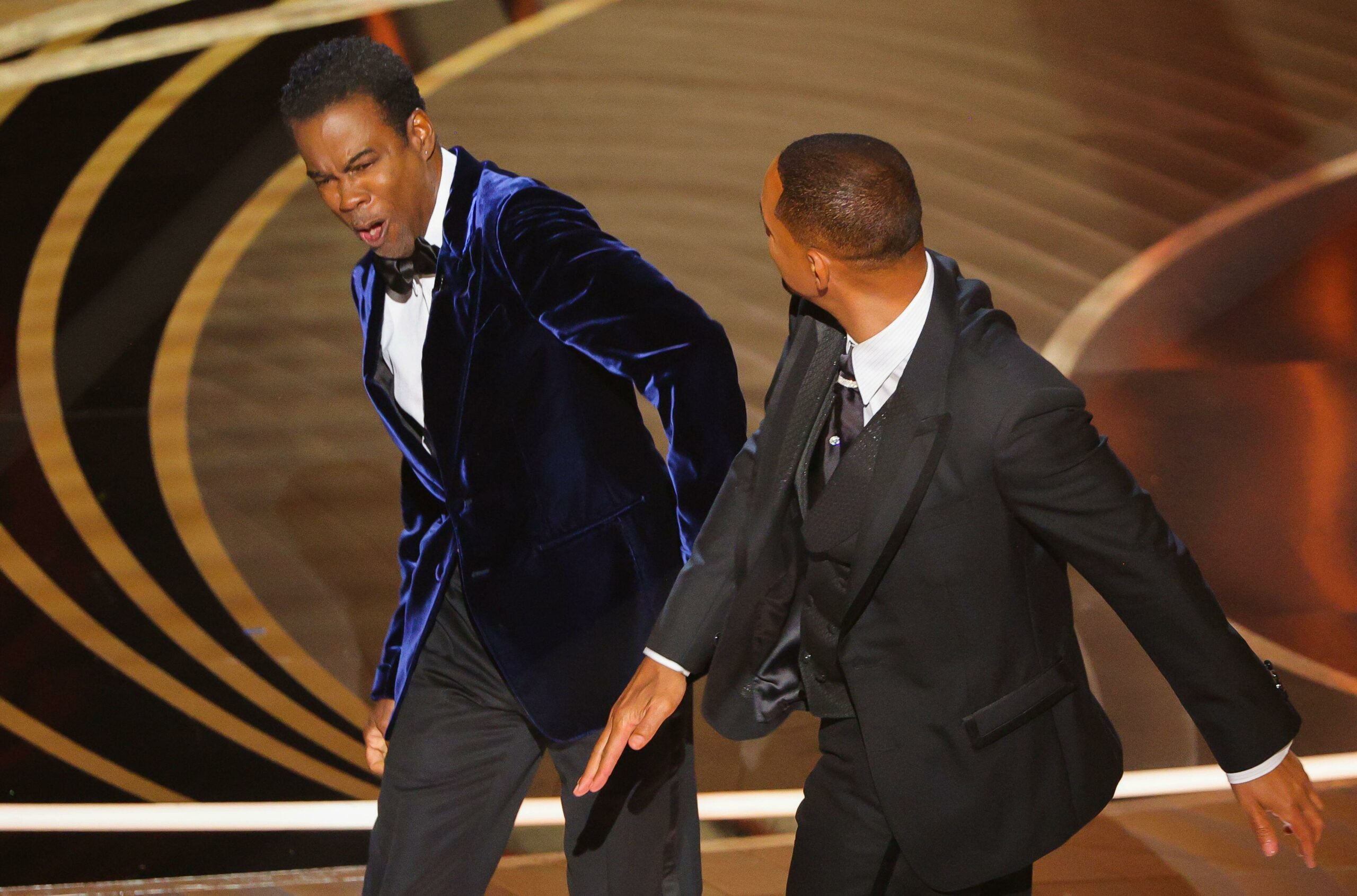 Chris Rock being slapped by Will Smith at the Oscars. 