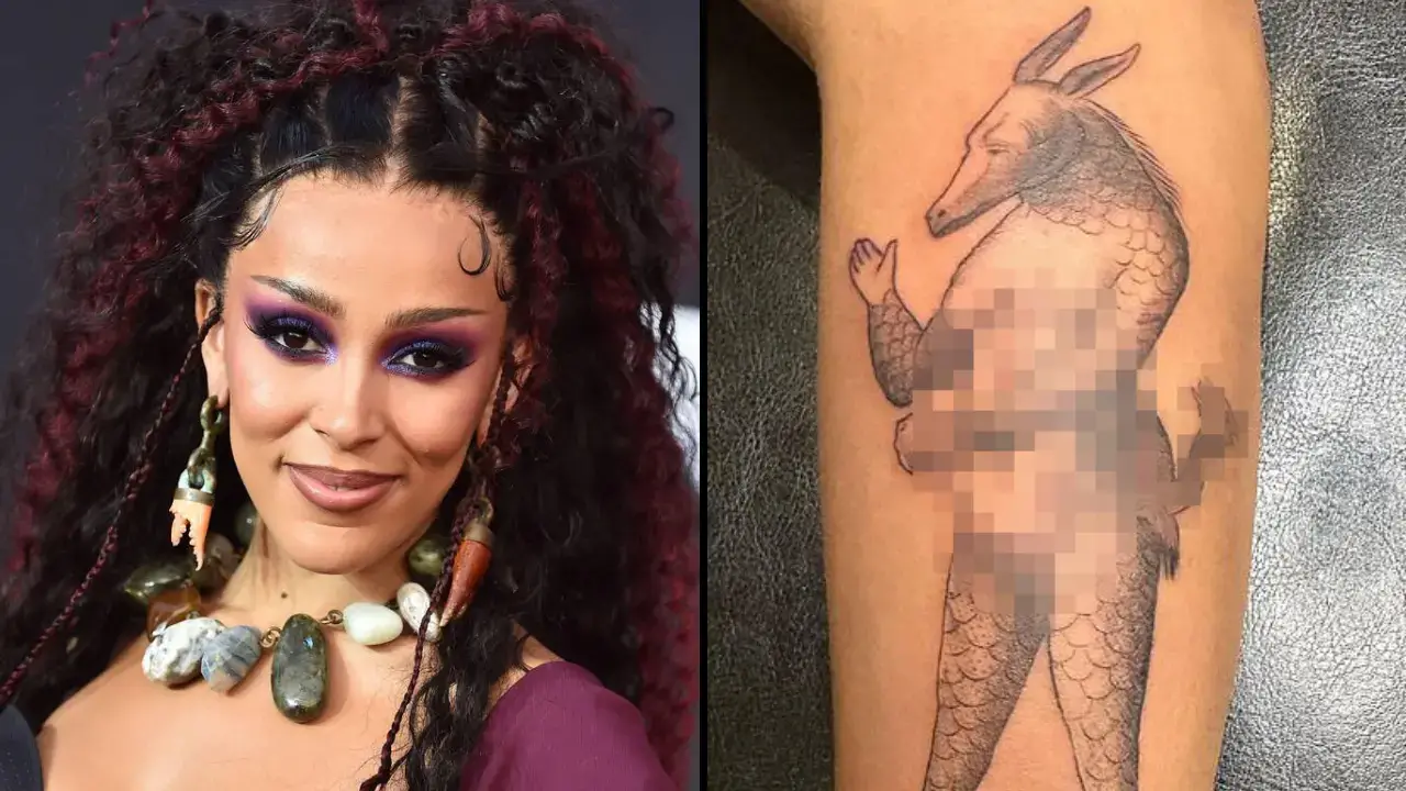 Doja Cat has responded to Christians who have been left furious by her 'demonic' new tattoo.