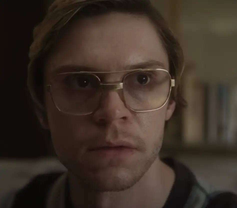 Evan Peters as Jeffrey Dahmer.