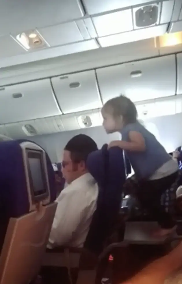 Toddler on eight-hour flight. 