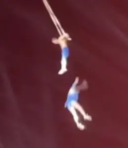 Sun Moumou performing stunt with her husband