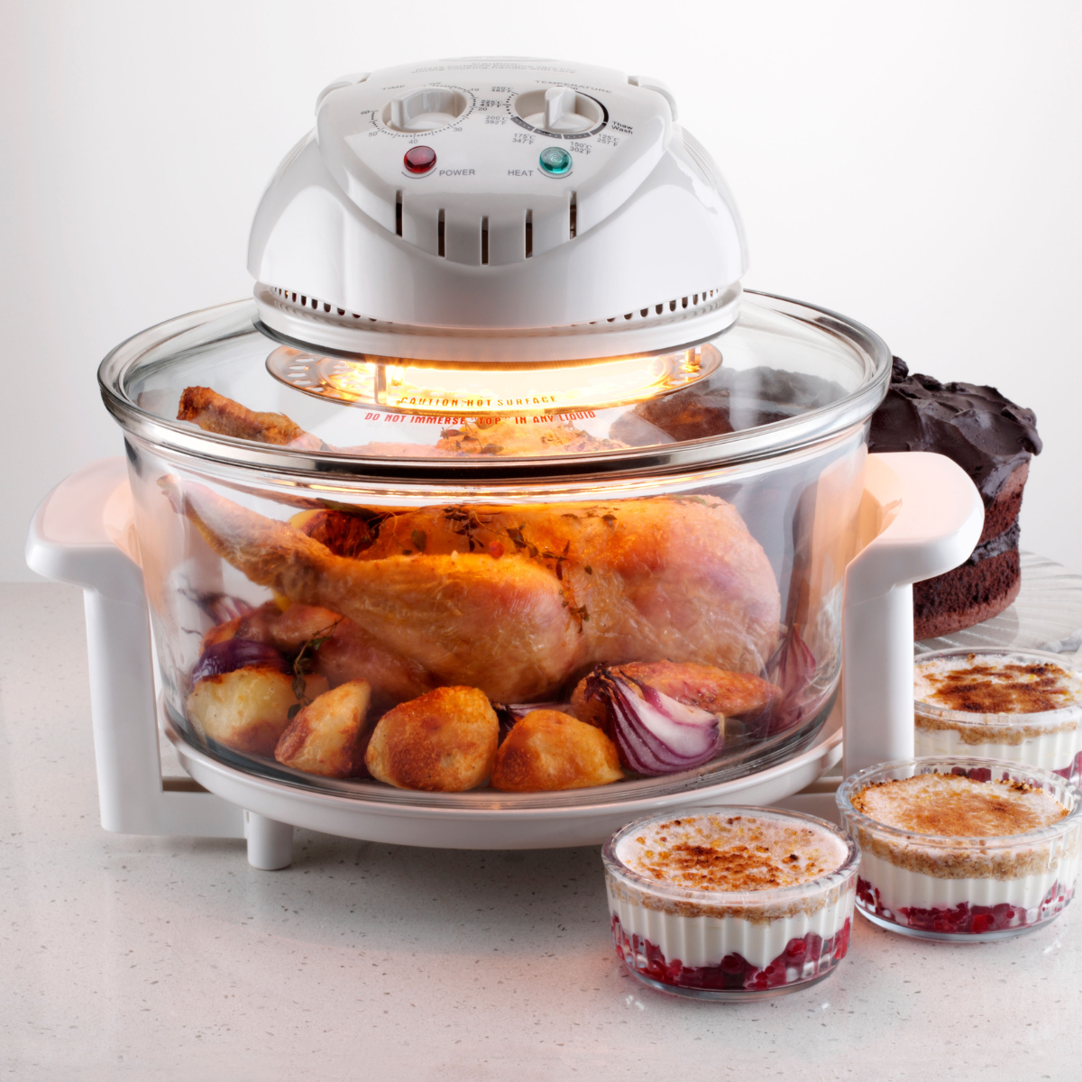 Halogen oven with chicken cooking