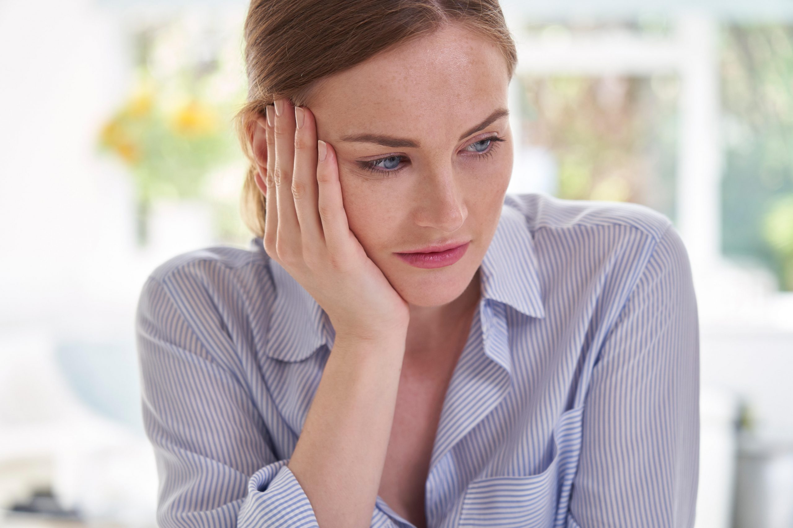 Woman looking fed up. 