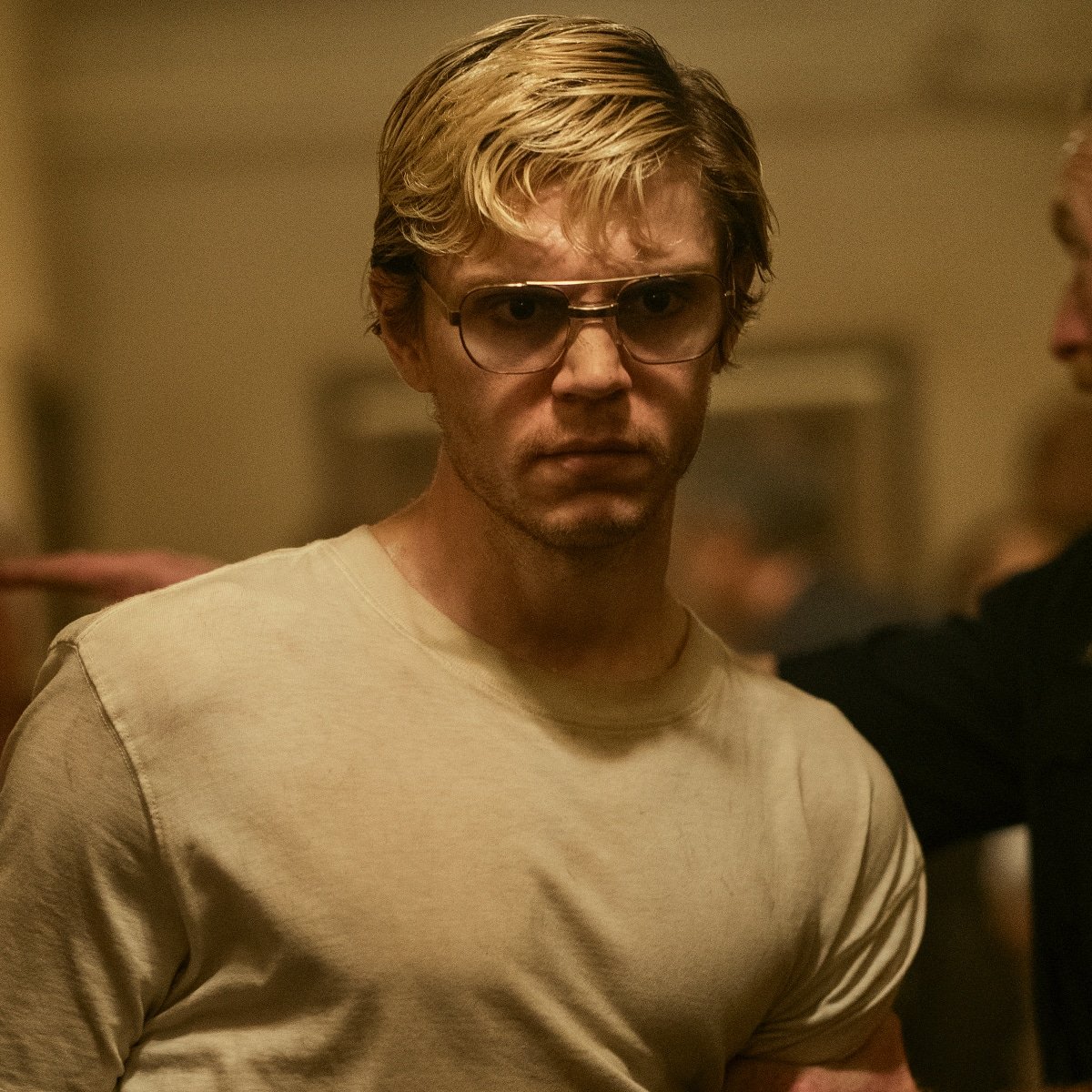 Evan Peters as Jeffrey Dahmer. 