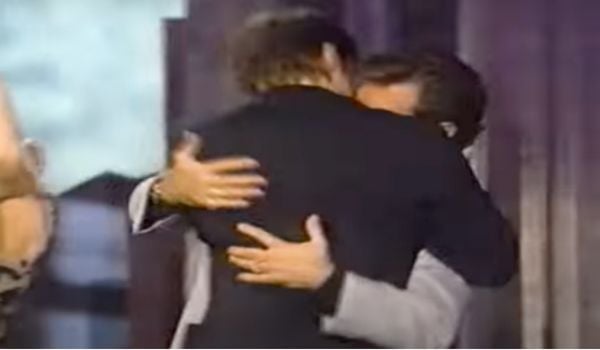 Jim Carrey kissing Chris Isaak