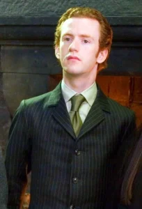 Chris Rankin as Percy Weasley.