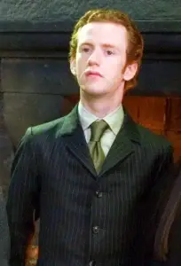 Chris Rankin as Percy Weasley.