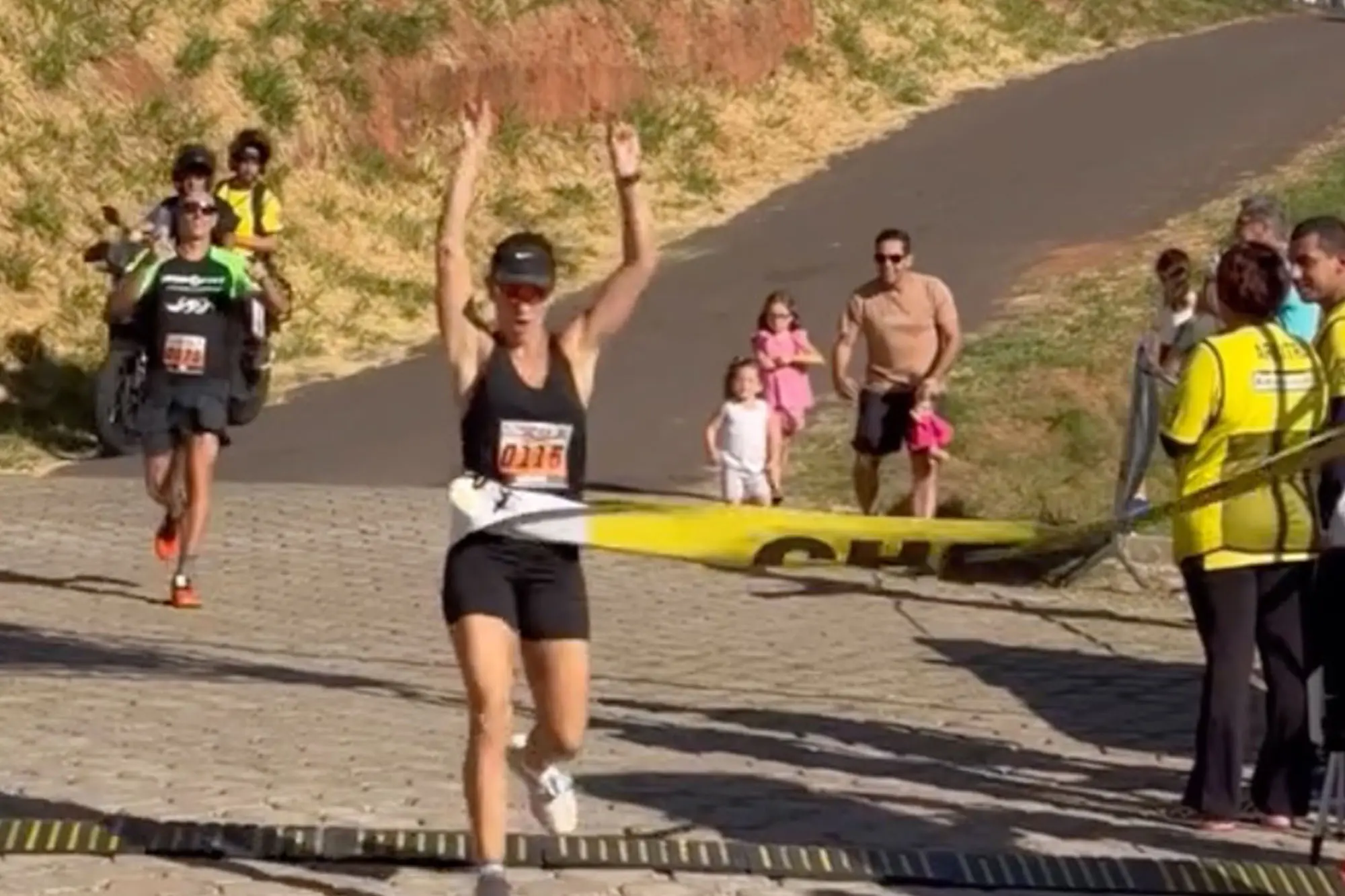 Woman's race being interrupted.