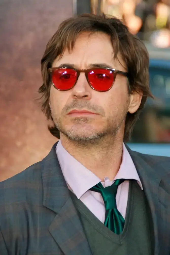 Robert Downey Jr. in red-tinted glasses.