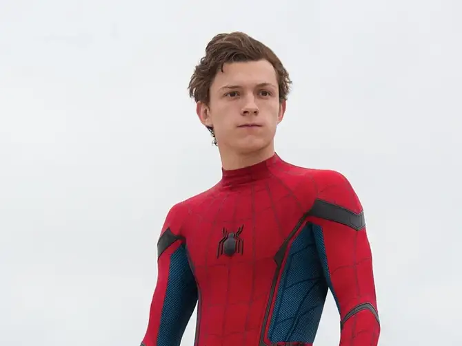 Tom Holland as Spider-Man.