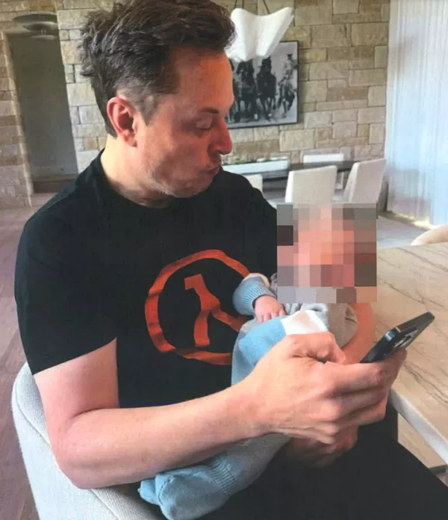 Elon Musk with alleged 13th child. 