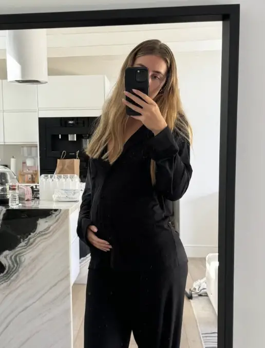 Lily Phillips' pregnancy bump.