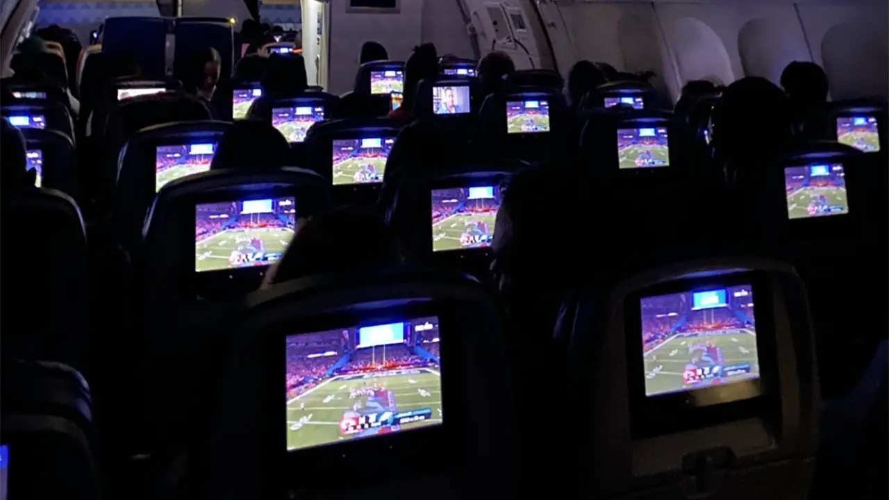 A plane passenger has sparked outrage after a photo revealed he was the only person on a flight not watching the Super Bowl.