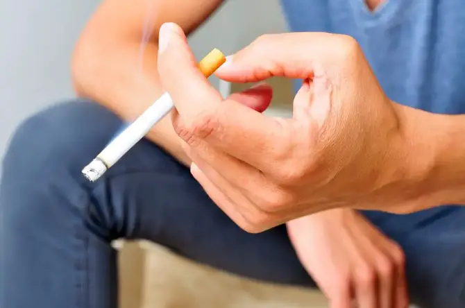 Man smoking.