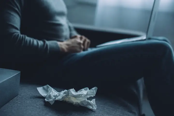 Self-pleasuring man and tissue.