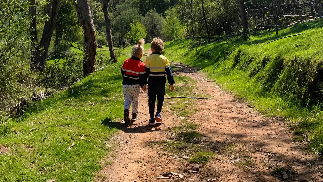 A mom's innocent photo of her two young children enjoying a walk through the Australian bush has left thousands of people feeling sick after a terrifying hidden detail was spotted.